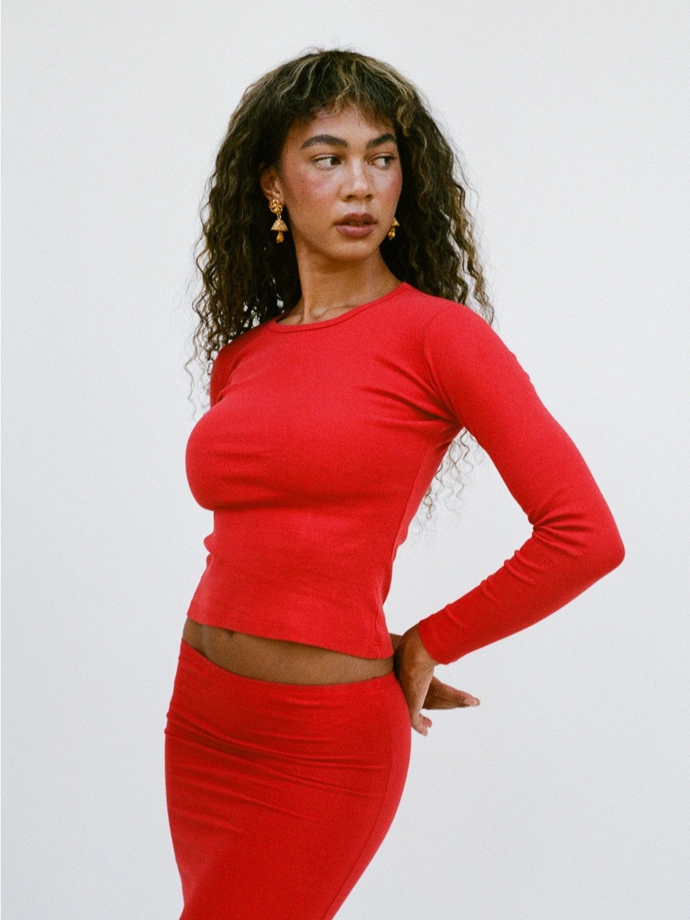 Gil Rodriguez Fitted Long-Sleeve Crewneck Top in Vibrant Red